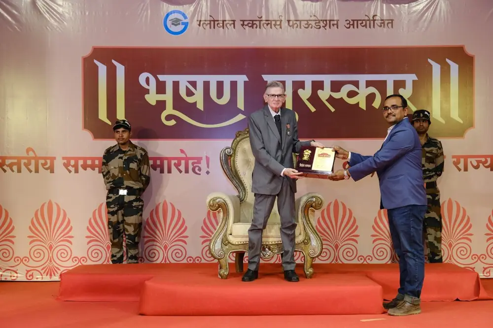 Dr. Pronab Haldar receiving the Bhushan Puraskar